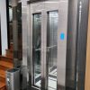 Thang máy vách kính gia đình inox gương trắng hoa văn